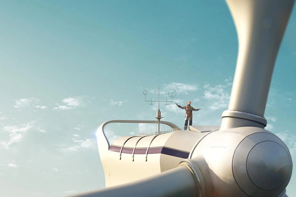 Happy engineer feel success after good work. He standing a top of windmill and looking beautiful sunset landscape