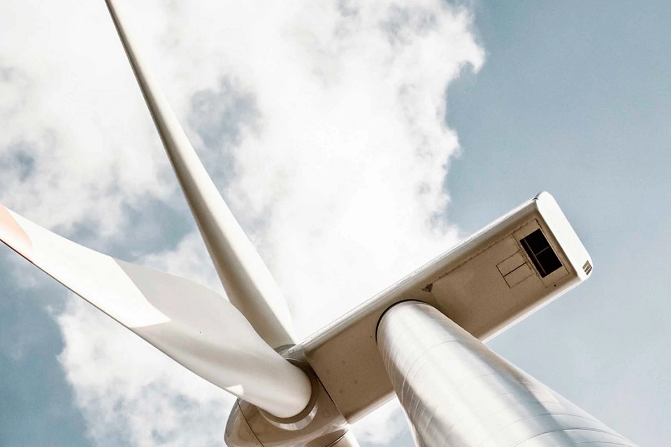 Wind turbine in retro colors with added grain