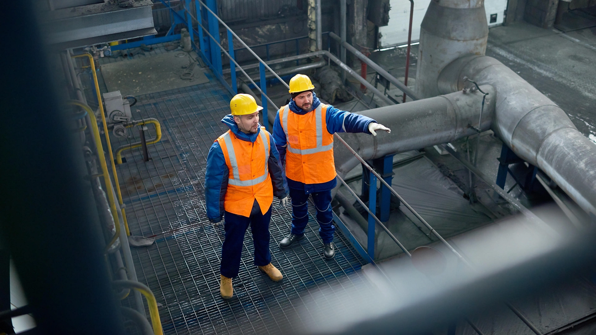 Bearded Engineers Wrapped up in Work
