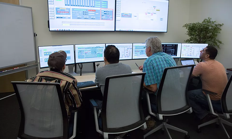 Clients using Emerson products and software run tests on their new equipment in the learning center at Emerson.

Company visit to Emerson Automation Solutions division in Pittsburgh, PA.