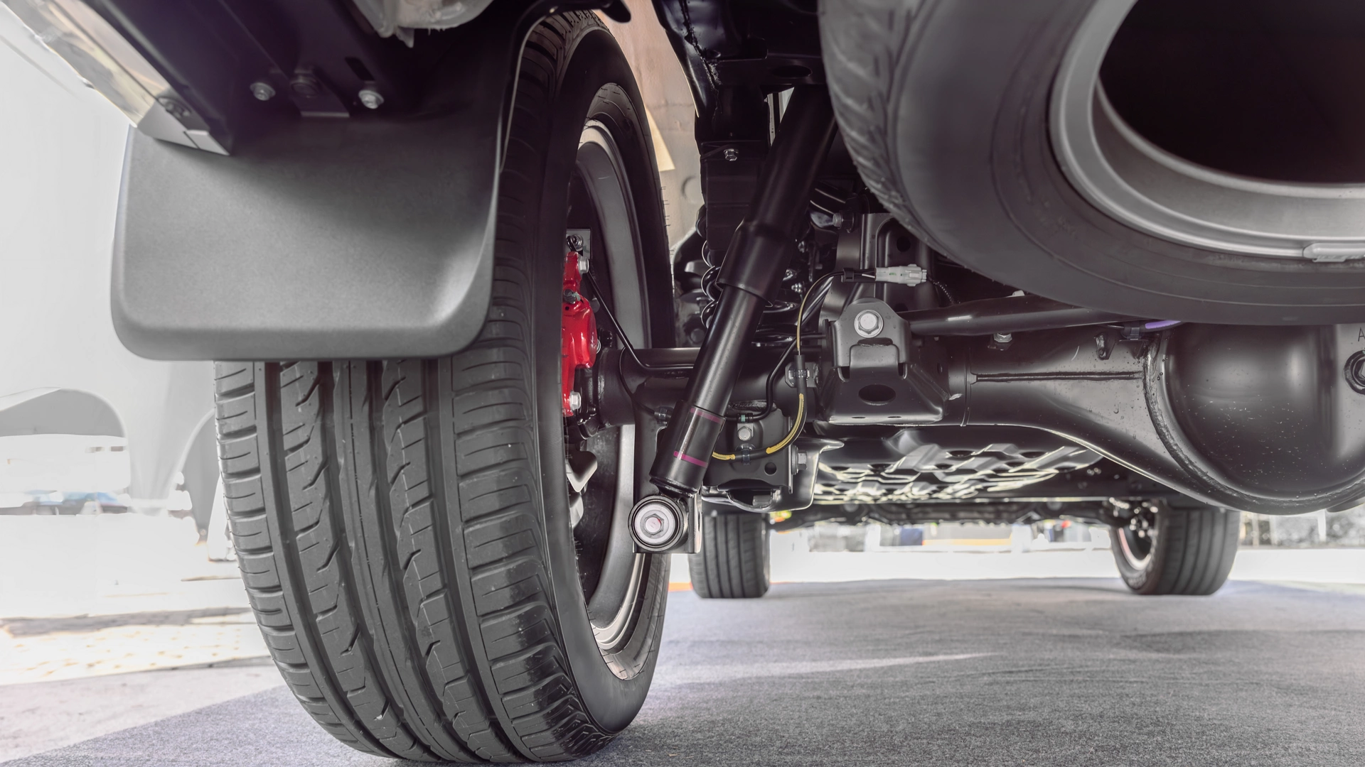 SUV car suspension and rear drive shaft.