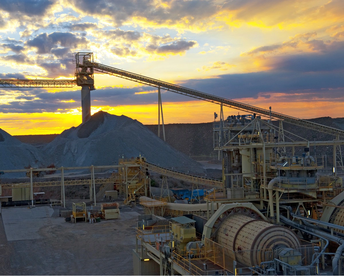 Sunset over mine, red sunset reflecting over the metals of the mine infrastructure Australia.