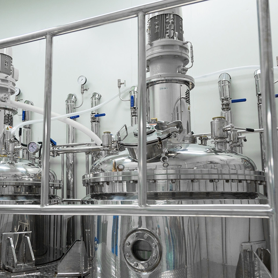 behind pipe bars, two big compression tanks behind pipe bars