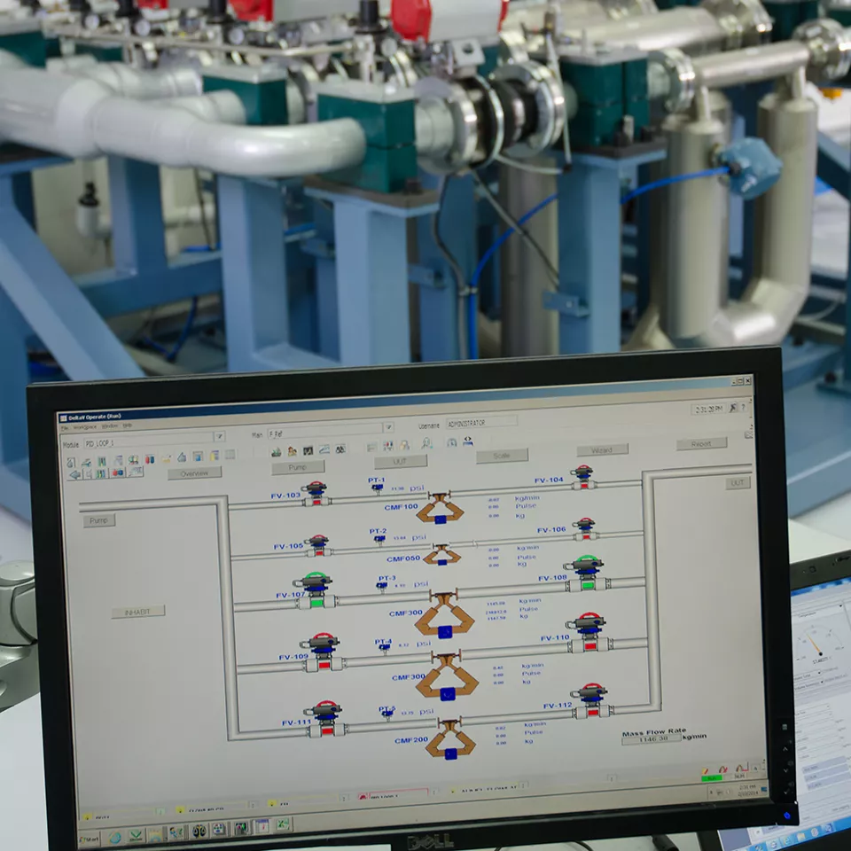 Industrial pipeline system with control interface showing a report