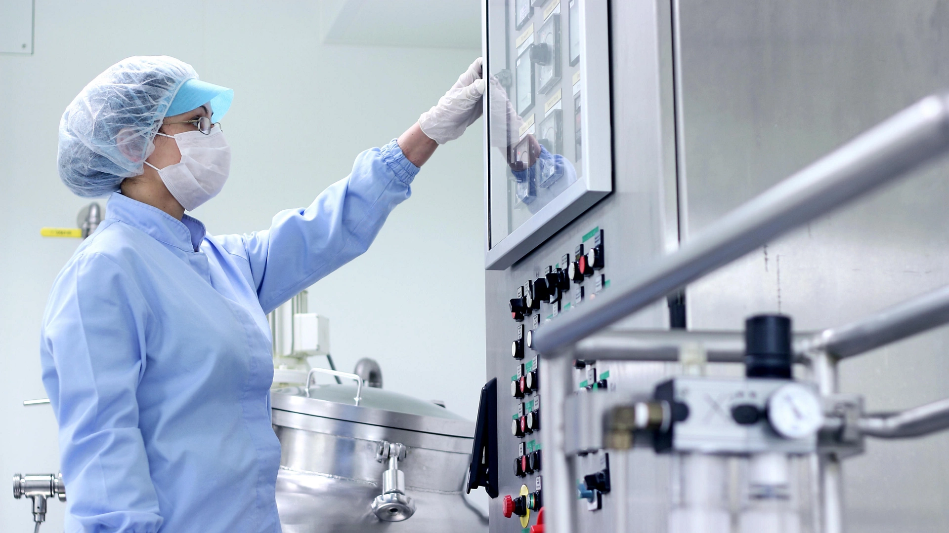 Preparing machine for work in pharmaceutical factory.