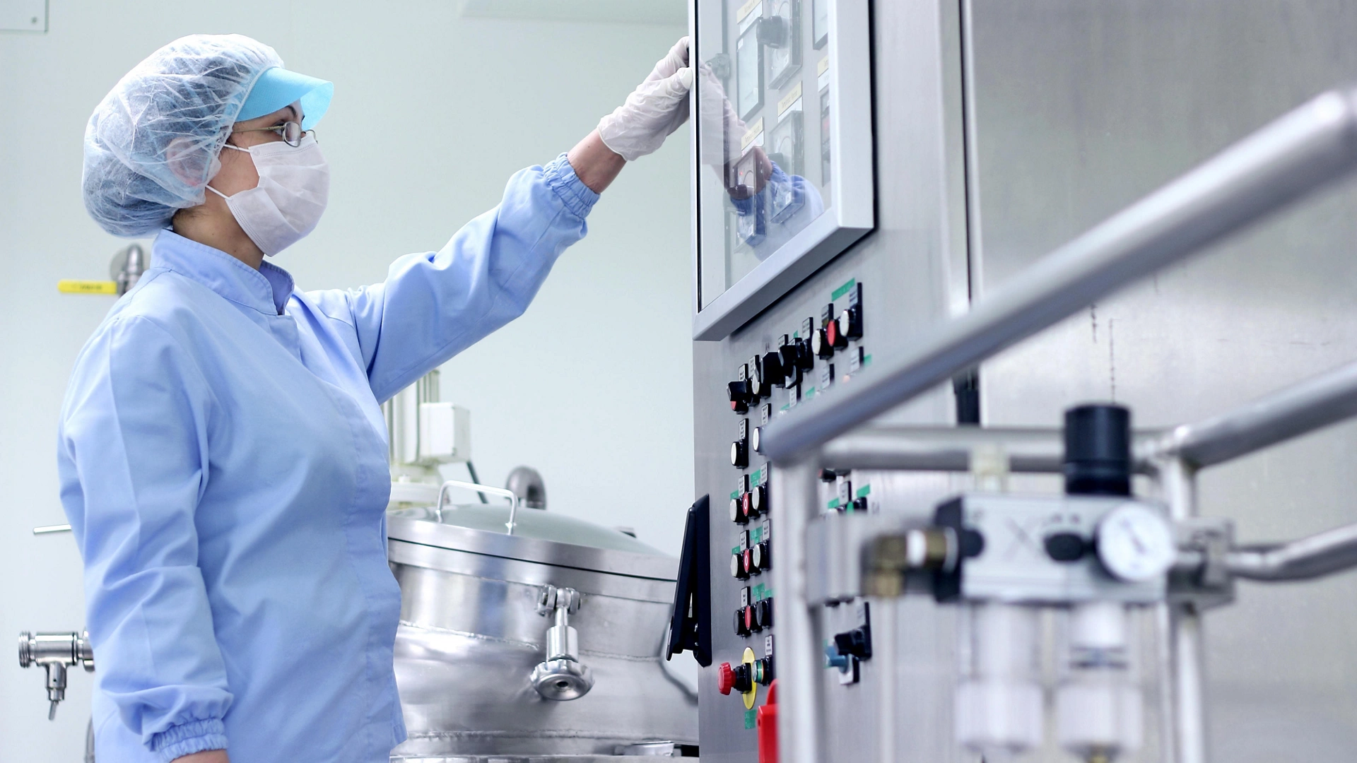 Preparing machine for work in pharmaceutical factory.