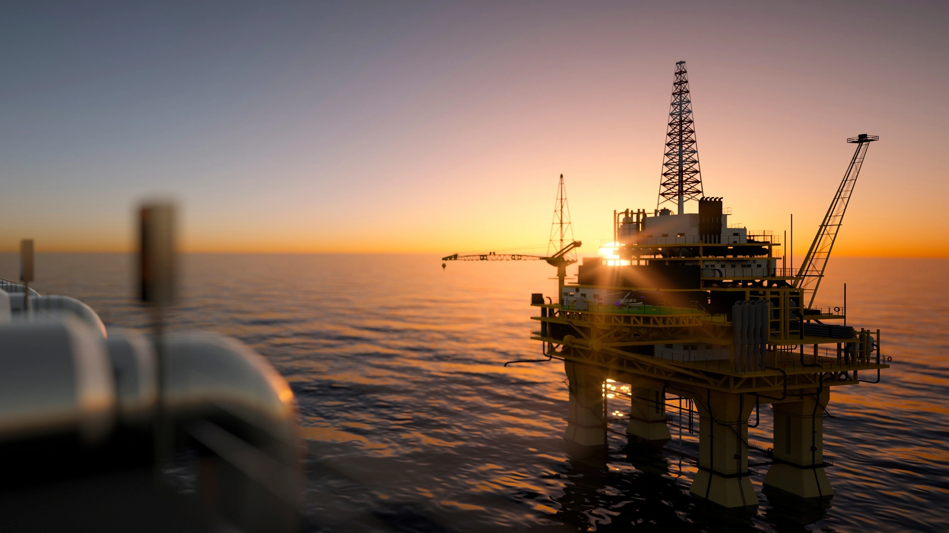 Large off shore oil rig platform in the ocean at sunset