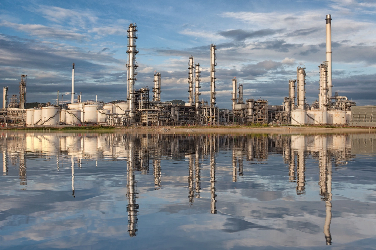 Reflection of oil refinery factory, chamical plant and enrgy concept